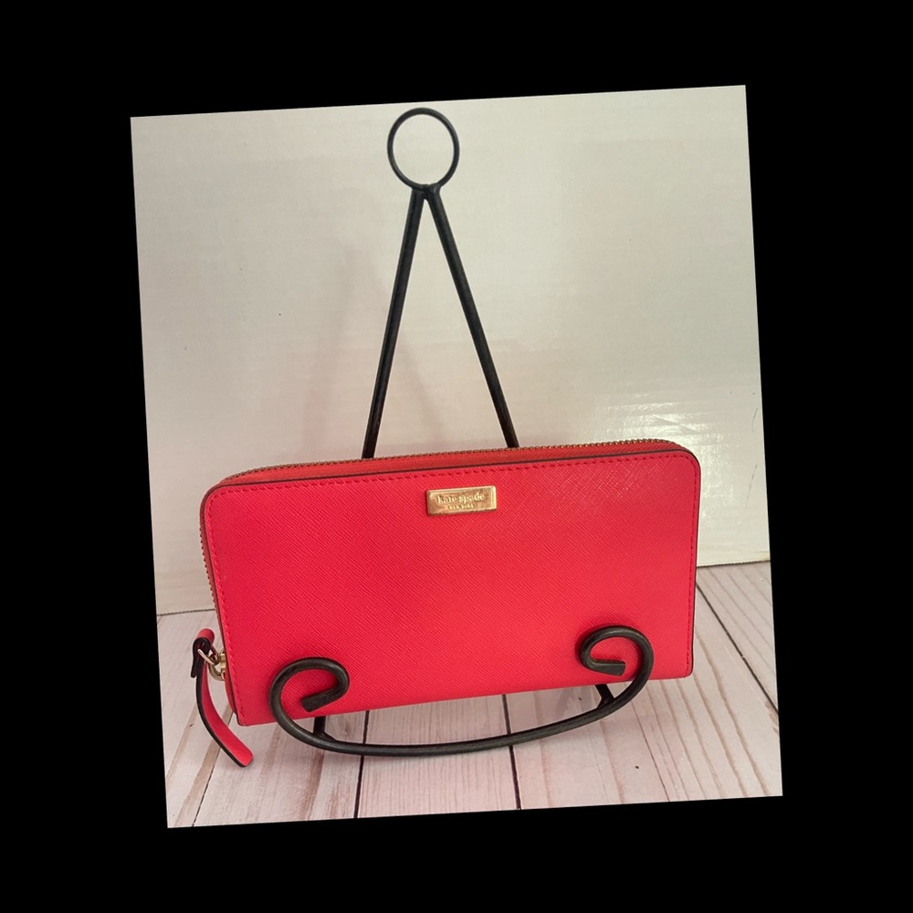 Kate Spade
Desert Rose Newbury Lane Gold Zip Around Leather Wallet